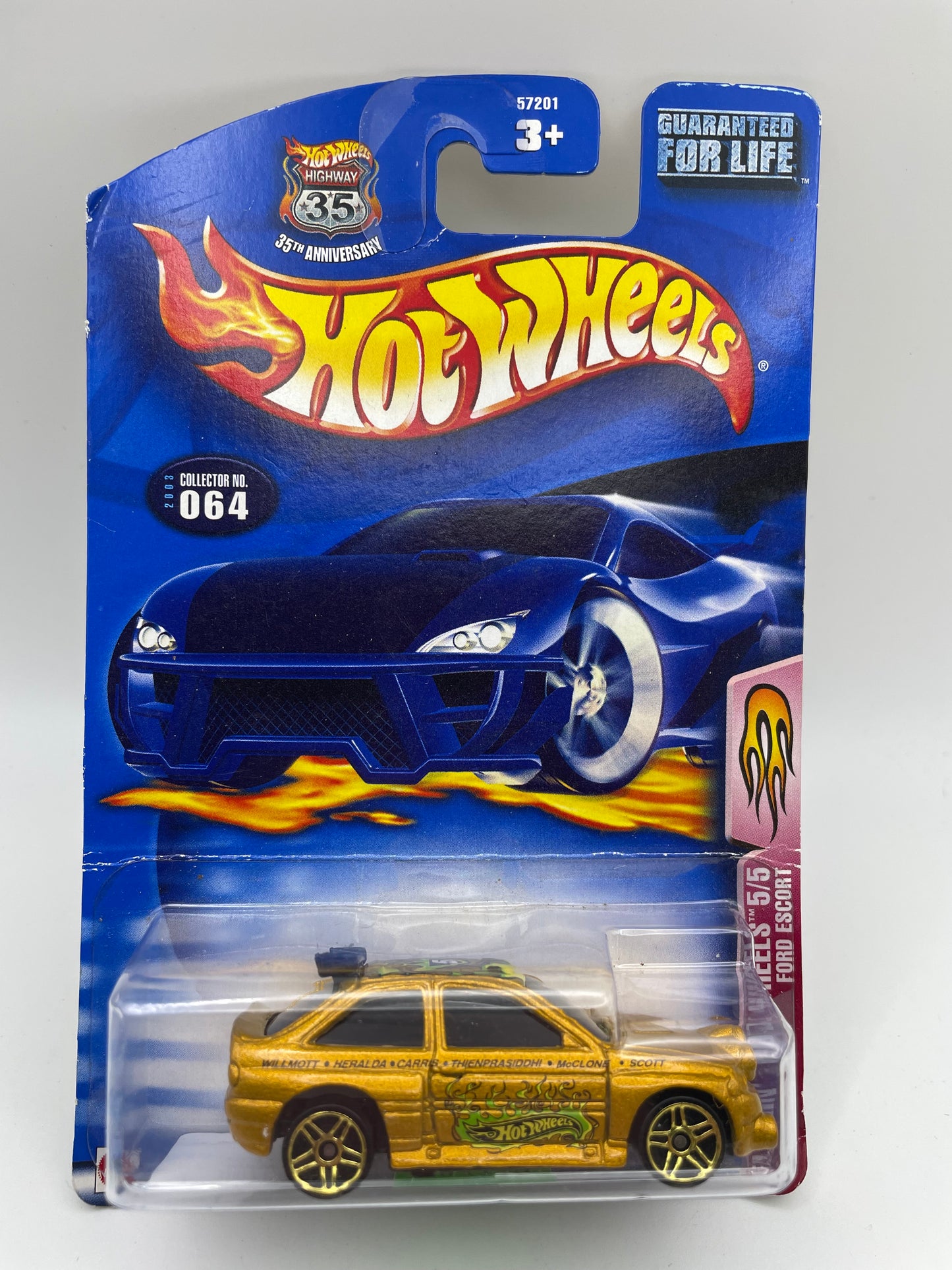 Hot Wheels - Flamin’ Hot Wheels - #064 5/5 Ford Escort Gold 2002 #103110