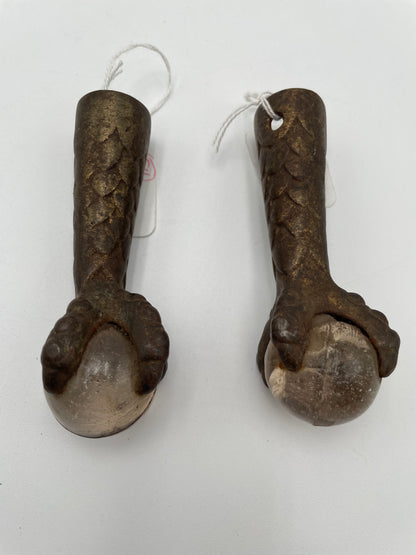 Two Antique Metal Claw Feet with Clear Glass Balls